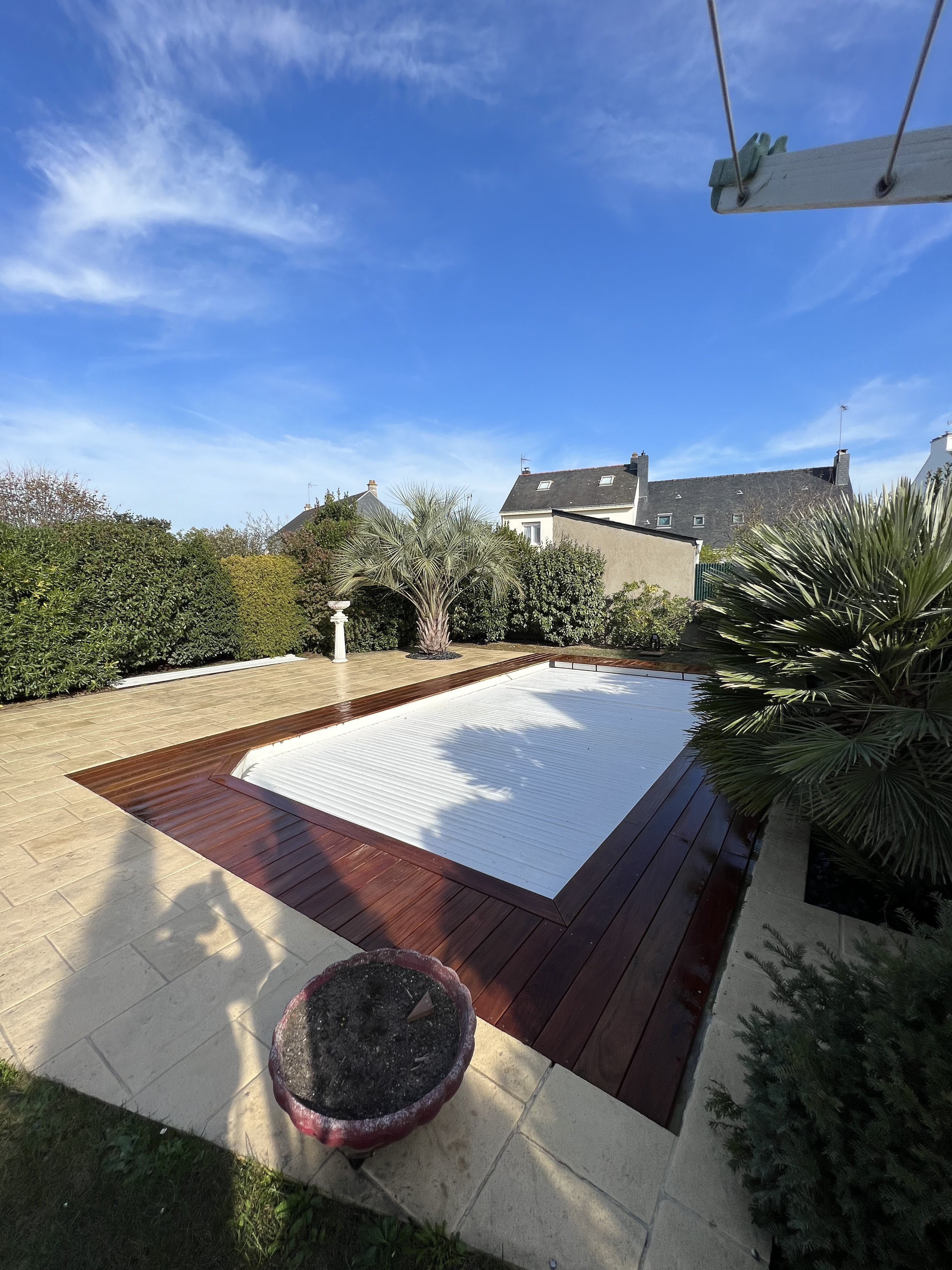 Raccordement terrasse bois IPE au dallage existant — Trignac